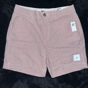 Cute pink and white checked pattern. Brand new, never worn with rage still on.